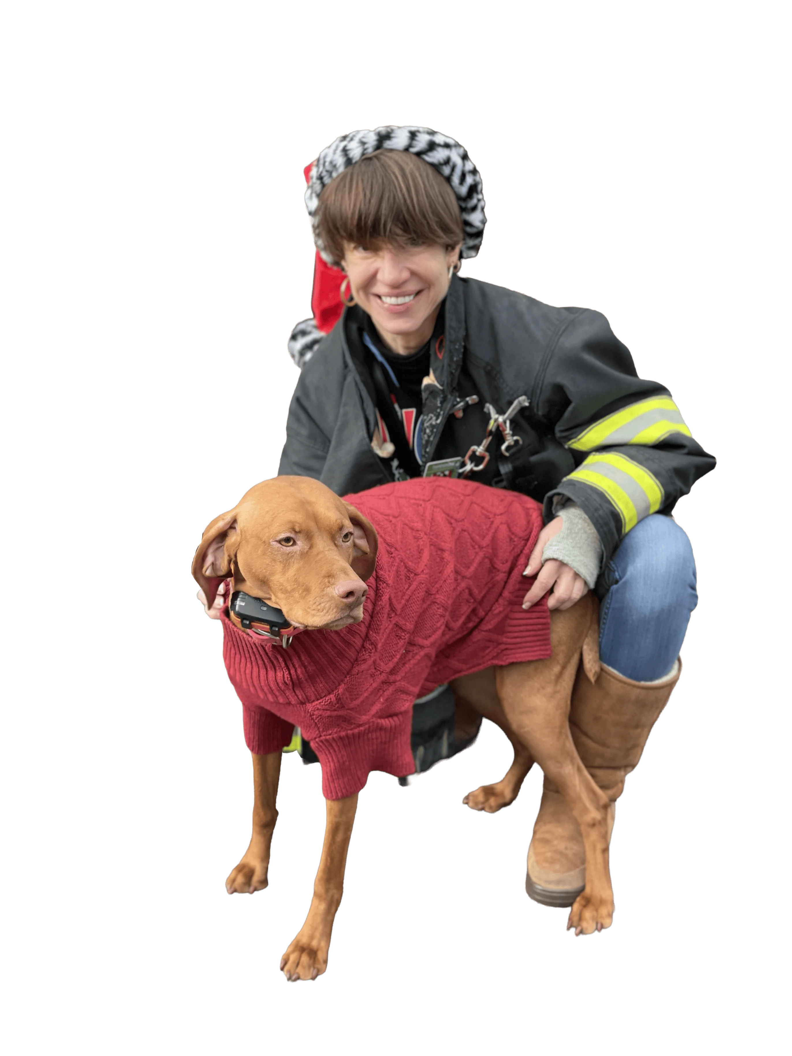 Margaret Cunzio in firefighter gear with dog
